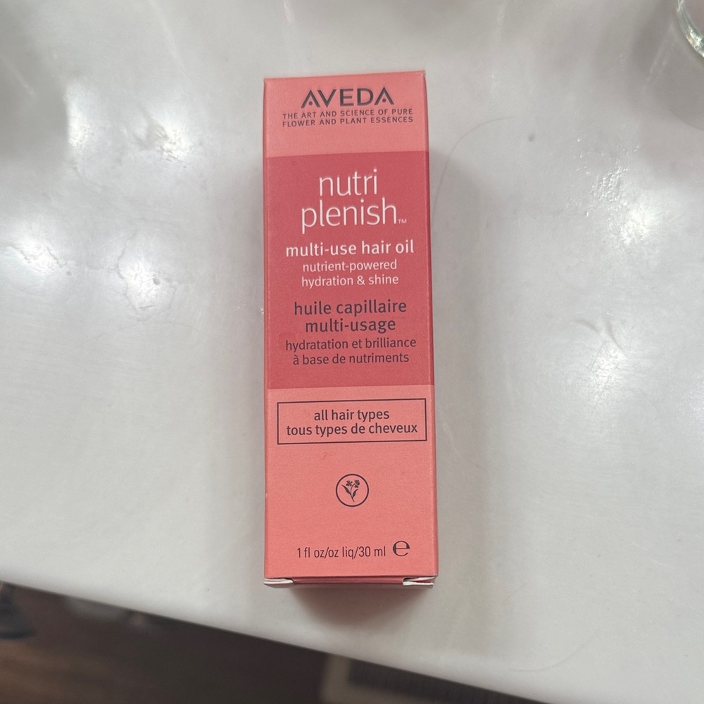 Aveda Nutriplenish Hair Oil in Pink Packaging